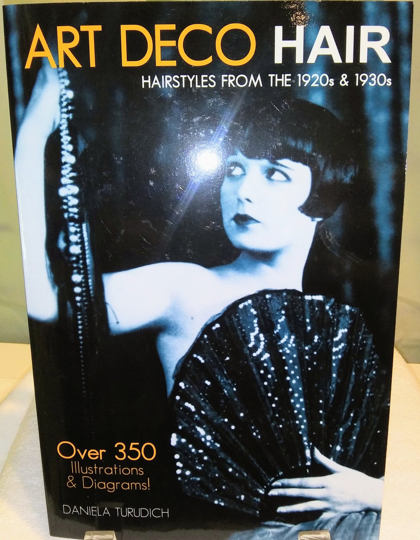 Art Deco Hair: Hairstyles from the 1920s & 1930s (Vintage Living) Paperback – July 15, 2013 by Daniela Turudich (Author)