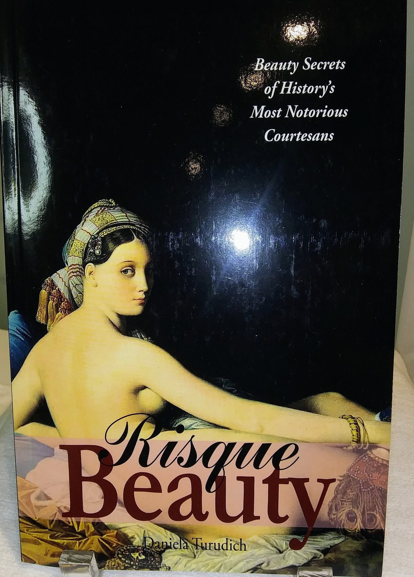 Risque Beauty: Beauty Secrets of History's Most Notorious Courtesans Paperback – September 5, 2014